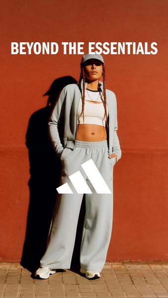 This ad features a woman wearing a matching sweatsuit set from Adidas. The ad's headline, "Beyond the Essential