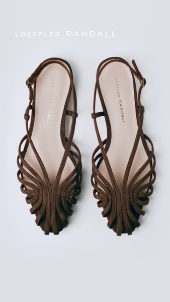This ad showcases a pair of strappy brown sandals, presenting them in a clean and minimalist style typical of high-end f