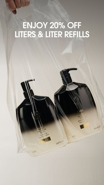 This ad promotes a sale on liter-sized bottles and refills from Oribe hair products.