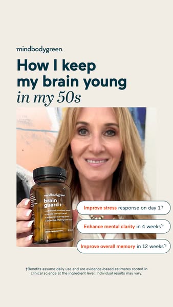 This is a paid social media ad for mindbodygreen's brain guard+ supplement. It features a woman holding the product 
