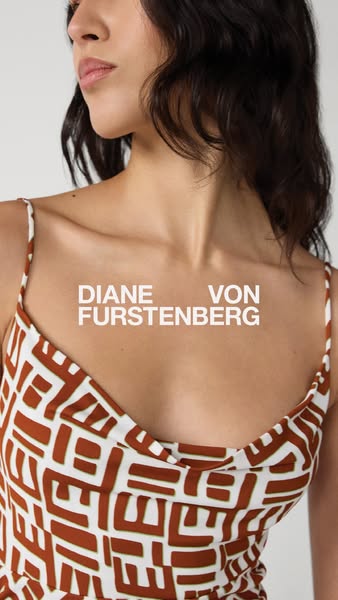 This ad is for Diane Von Furstenberg and features a woman wearing one of their dresses. The image is a medium shot of th