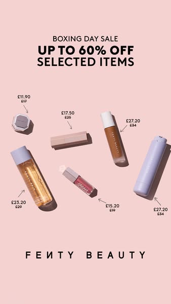 This ad showcases a variety of Fenty Beauty products available at up to 60% off for a Boxing Day sale.
