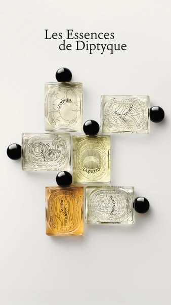 This ad showcases the Les Essences de Diptyque collection of fragrances in a minimalist, high-end style.