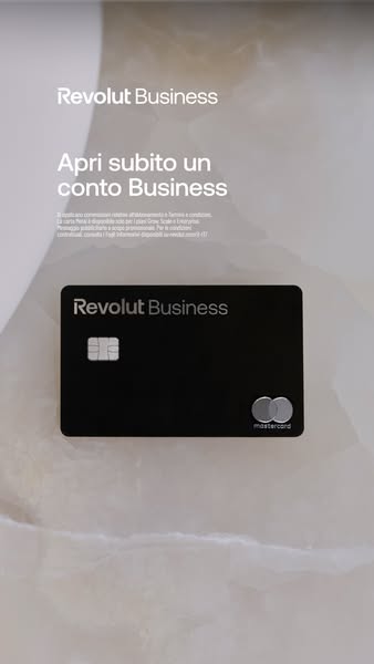 This image ad for Revolut Business features a sleek, minimalist design with a black Revolut Business card prominently di