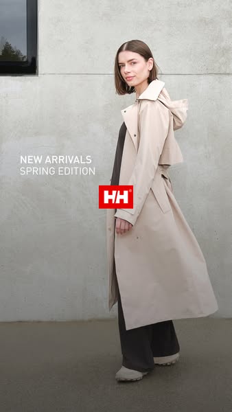 This is an ad for Helly Hansen's new spring arrivals. The ad features a model in a beige trench coat.