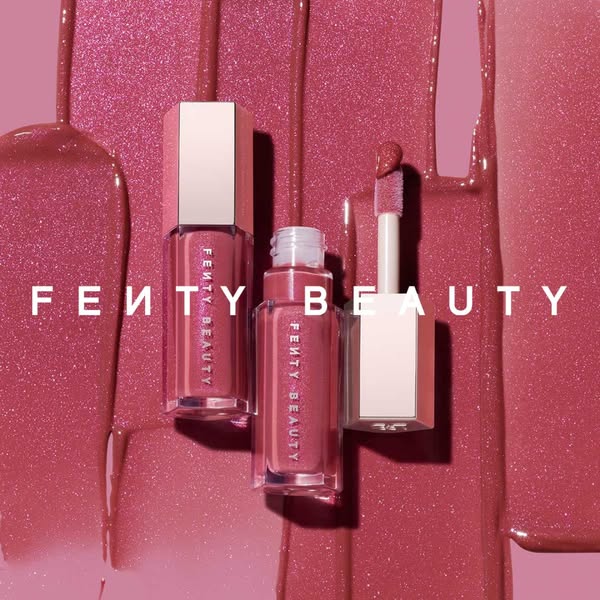 An ad showcasing Fenty Beauty lip gloss.
