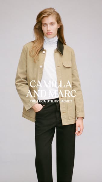 This image ad for Camilla and Marc features a fair-skinned woman wearing a utilitarian jacket, turtleneck, and black pan