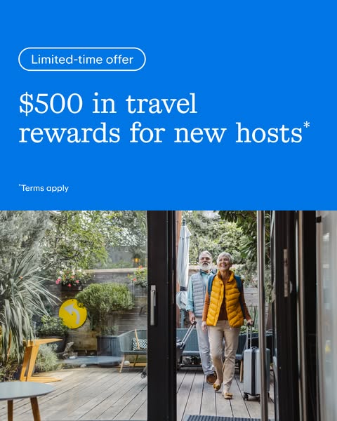 This image ad promotes a limited-time offer of $500 in travel rewards for new hosts. An elderly couple is depicted with 