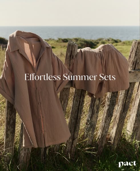 This ad showcases two-piece summer sets from Pact, featuring a button-down shirt and shorts. The clothing is draped over