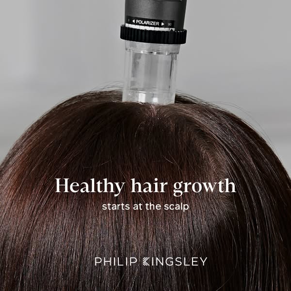 This ad features an image of a scalp being analyzed by a specialized tool. The ad highlights the importance of scalp hea