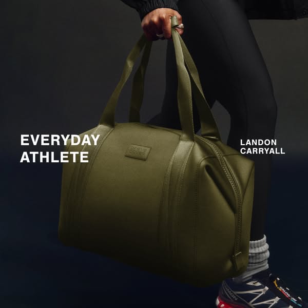 This ad for Dagne Dover's Landon Carryall bag features the bag being held by a model. The ad highlights the product&