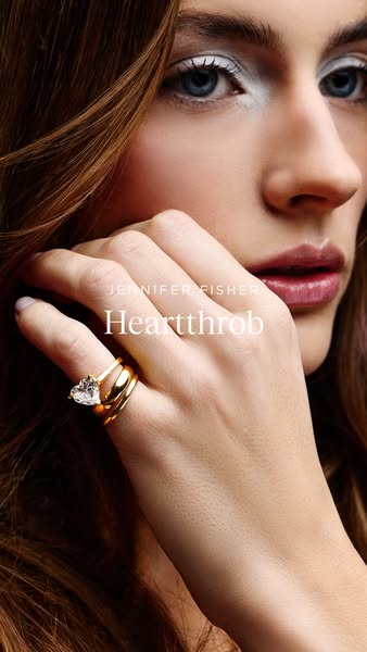 This ad for Jennifer Fisher features a close-up of a woman's hand wearing a "Heartthrob" ring and two plai