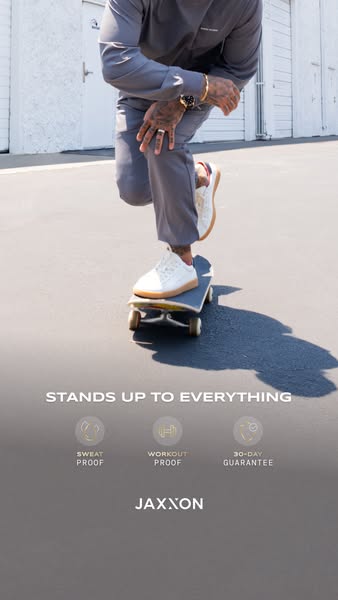 The ad features an individual standing on a skateboard on a paved road. The ad promotes the product by highlighting its 