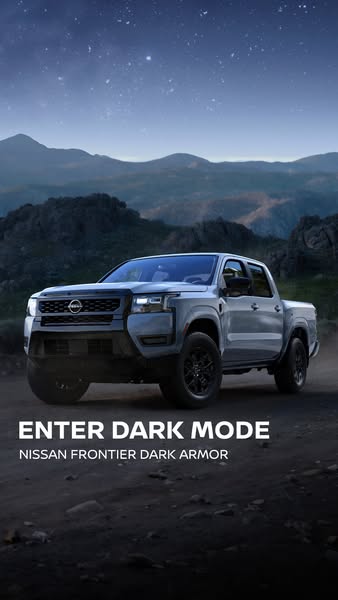 An ad for the Nissan Frontier Dark Armor, featuring a hero shot of the car in a natural setting at nighttime.