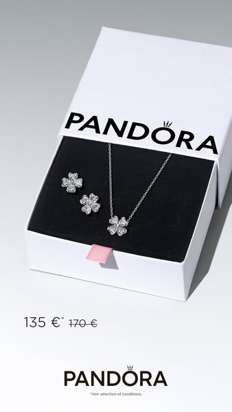 This ad features a Pandora necklace and earring set in a white jewelry box on a white background. The ad includes the br