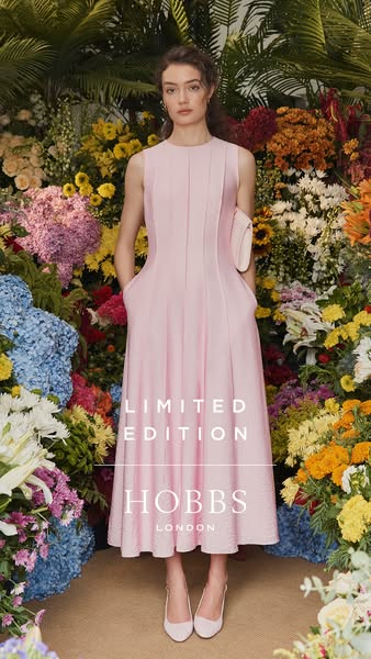 This ad features a model in a pink dress in front of a flower wall background. The ad highlights that this is a limited 