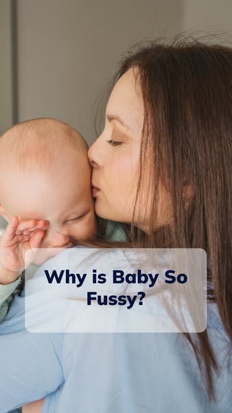 This image ad shows a mother kissing her baby on the head, with a text overlay asking why the baby is fussy. This ad is 