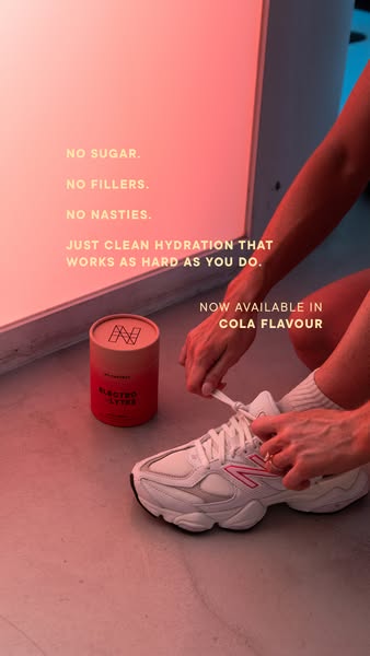 The ad is promoting a clean hydration product called 'ELECTROLYTES' in a new Cola flavor. It emphasizes the abse