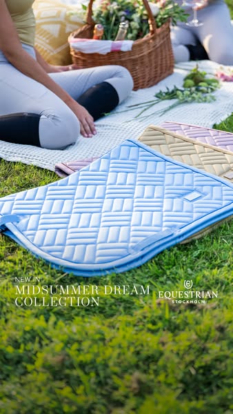 This image ad features equestrian saddle pads, emphasizing their visual appeal and newness within the 'Midsummer Dre