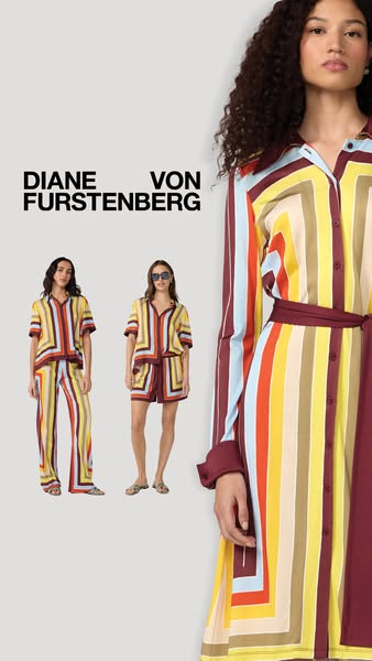 The ad features Diane Von Furstenberg clothing. There is a full body shot of a model wearing a multicolored, vertically-