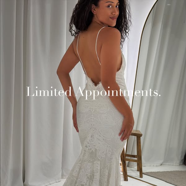 This ad features a woman in a white lace gown in front of a mirror with the text "Limited Appointments."