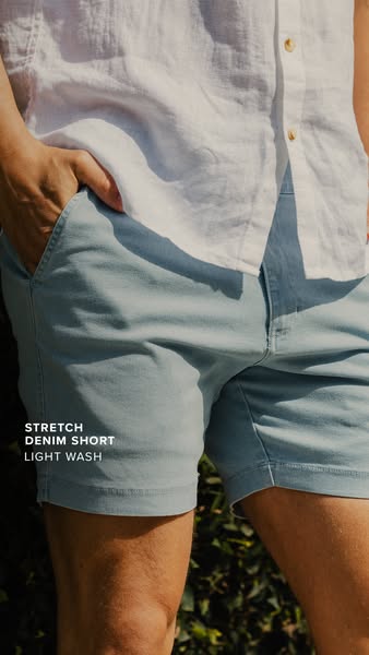 This ad promotes light wash stretch denim shorts.