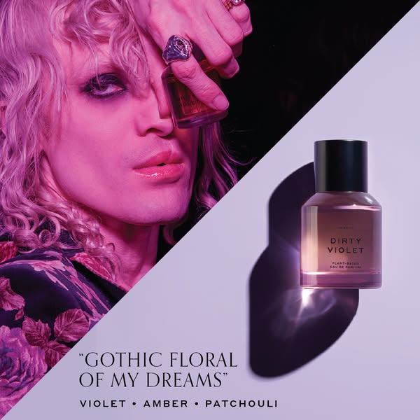 An ad for Dirty Violet perfume that features a portrait of a model with high fashion, goth aesthetic along with a quote 