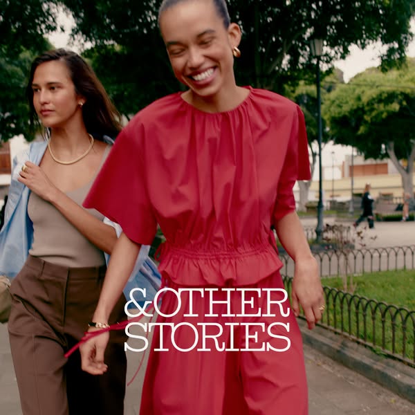 This ad features two women walking outdoors while wearing clothing from & Other Stories.