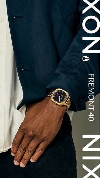 This image ad showcases the Nixon Fremont 40 watch. A person is wearing the watch with the brand name displayed on the r