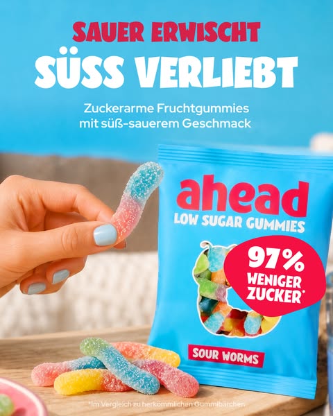 This ad promotes Ahead low-sugar sour gummy worms, emphasizing their sweet and sour taste with significantly reduced sug