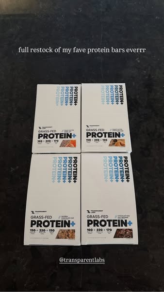 This ad features a restock of Transparent Labs grass-fed protein bars. The image shows four boxes of the protein bars, t