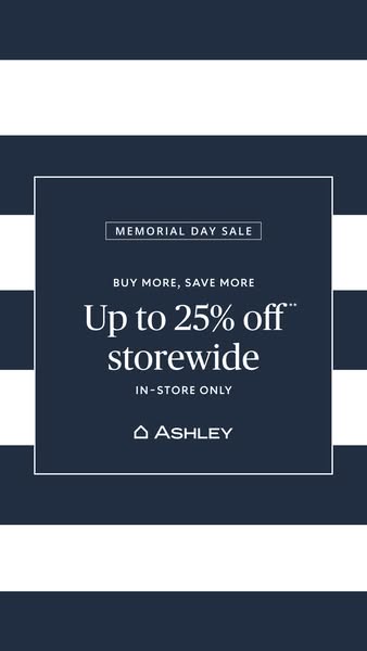 This is a simple image ad promoting a Memorial Day Sale at Ashley Furniture. The background is a navy and white nautical