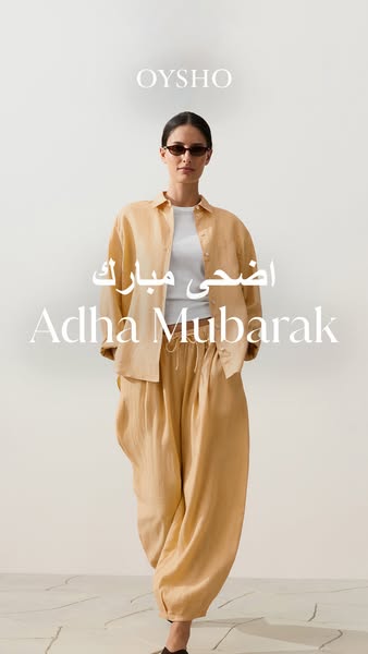 This ad by Oysho features a woman wearing a linen outfit in a studio setting. The ad wishes viewers a happy Eid Mubarak.