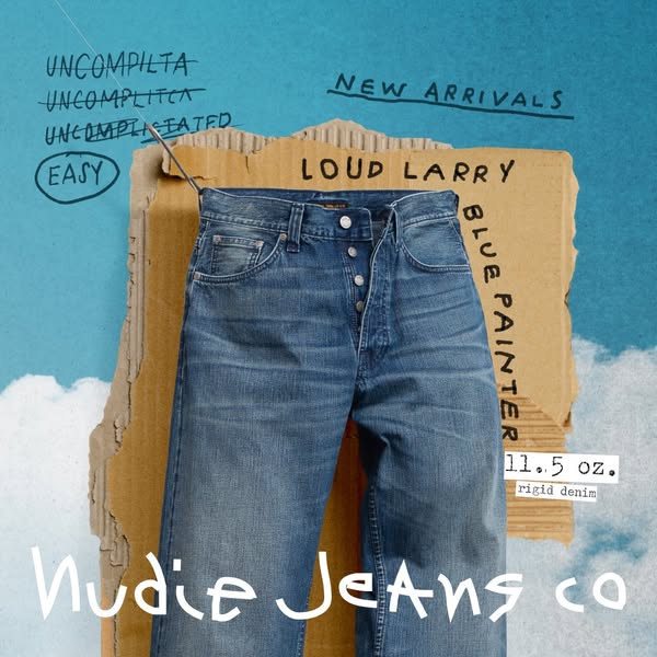 This ad features a pair of Nudie Jeans. The background is a blue sky with clouds on the top left and a piece of cardboar