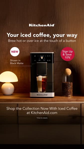 This image ad promotes KitchenAid iced coffee makers. It features a product shot of the black matte iced coffee maker se