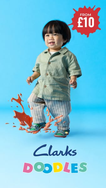 This ad features a toddler happily walking in Clarks Doodles sandals with a splash of orange paint at their feet on a li