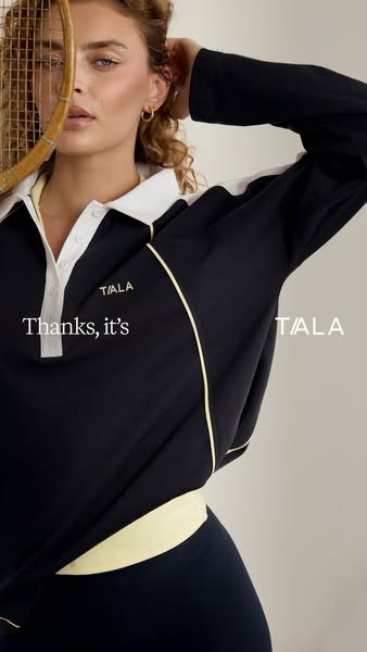 This ad features a woman wearing a TALA long-sleeve shirt with a polo collar in a sporty pose. The ad employs the 'T