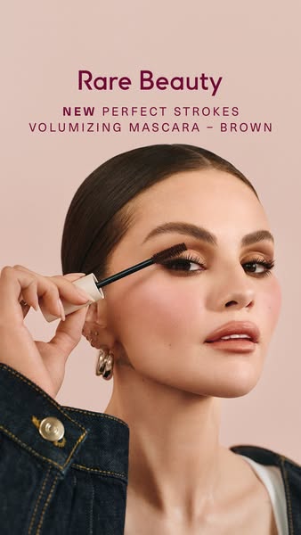 An ad for Rare Beauty mascara featuring Selena Gomez applying the product.