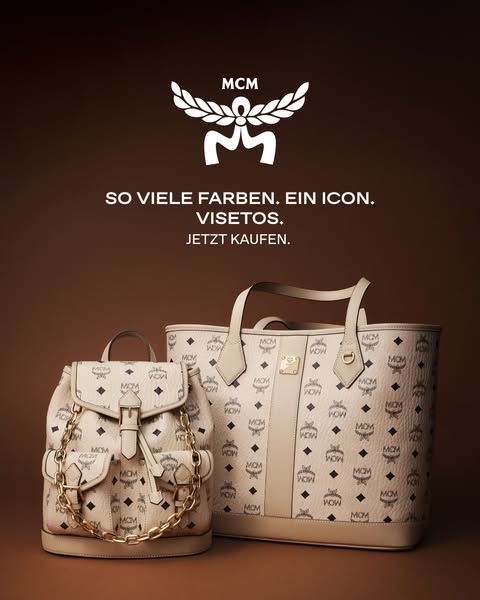 An ad promoting MCM's Visetos line, showcasing a backpack and tote bag with the brand's signature pattern.