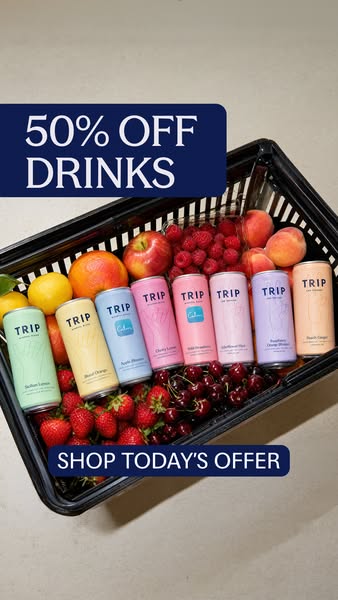 This ad showcases a variety of TRIP CBD-infused drinks arranged in a shopping basket along with fresh fruit, emphasizing