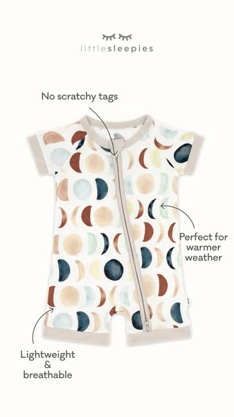 A close-up shot of a moon phases patterned romper made for warmer weather.