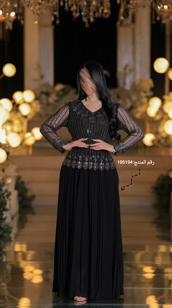 This image ad showcases a woman wearing an elegant black dress. The model's face is blurred, and the focus is on the