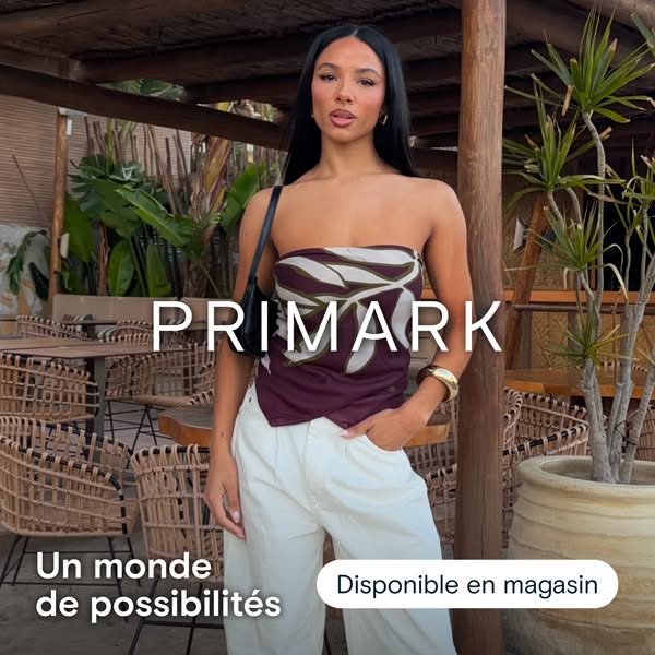 This ad showcases a woman in a printed top and high-waisted pants. The ad highlights the brand's current availabilit