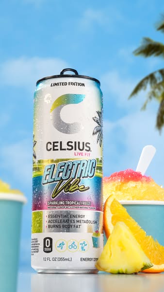 This image ad showcases a can of limited edition Celsius energy drink in Electric Vibe sparkling tropical freeze flavor.