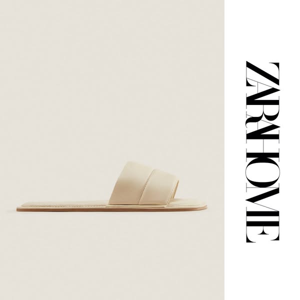 This ad showcases a pair of Zara Home slides against a neutral background with the brand logo.