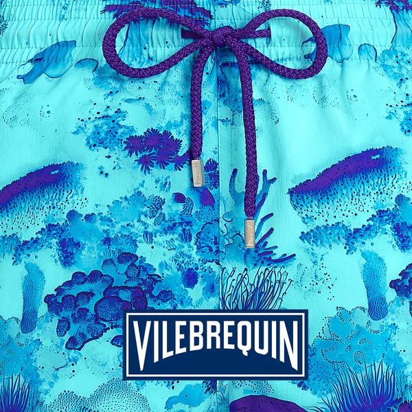 This is a close up shot of Vilebrequin brand swim trunks, highlighting the design.