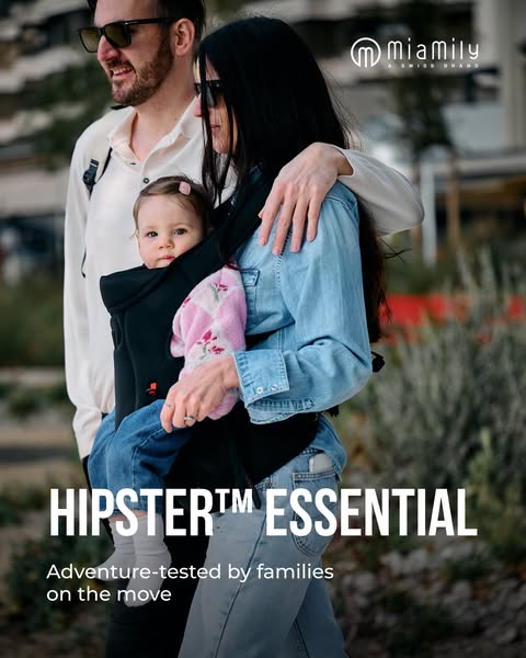 This ad showcases the brand's baby carrier with a photo of a family walking outside, emphasizing the carrier's b