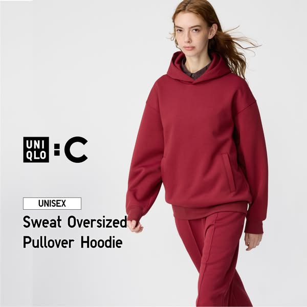 A static image ad showcasing a red unisex sweat oversized pullover hoodie from Uniqlo.