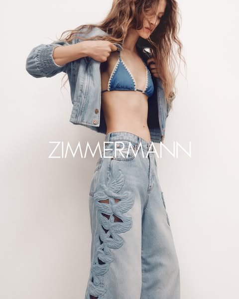 A woman is shown wearing a bikini top, denim jacket, and jeans with an interesting pattern. The brand "Zimmermann&q