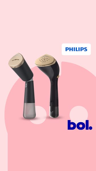 This is an advertisement for a Philips handheld steamer. The ad features two of the steamers on a pink background with b